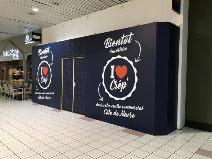 Image Habillage adhésif pour commerce pendant travaux Ã  Caen